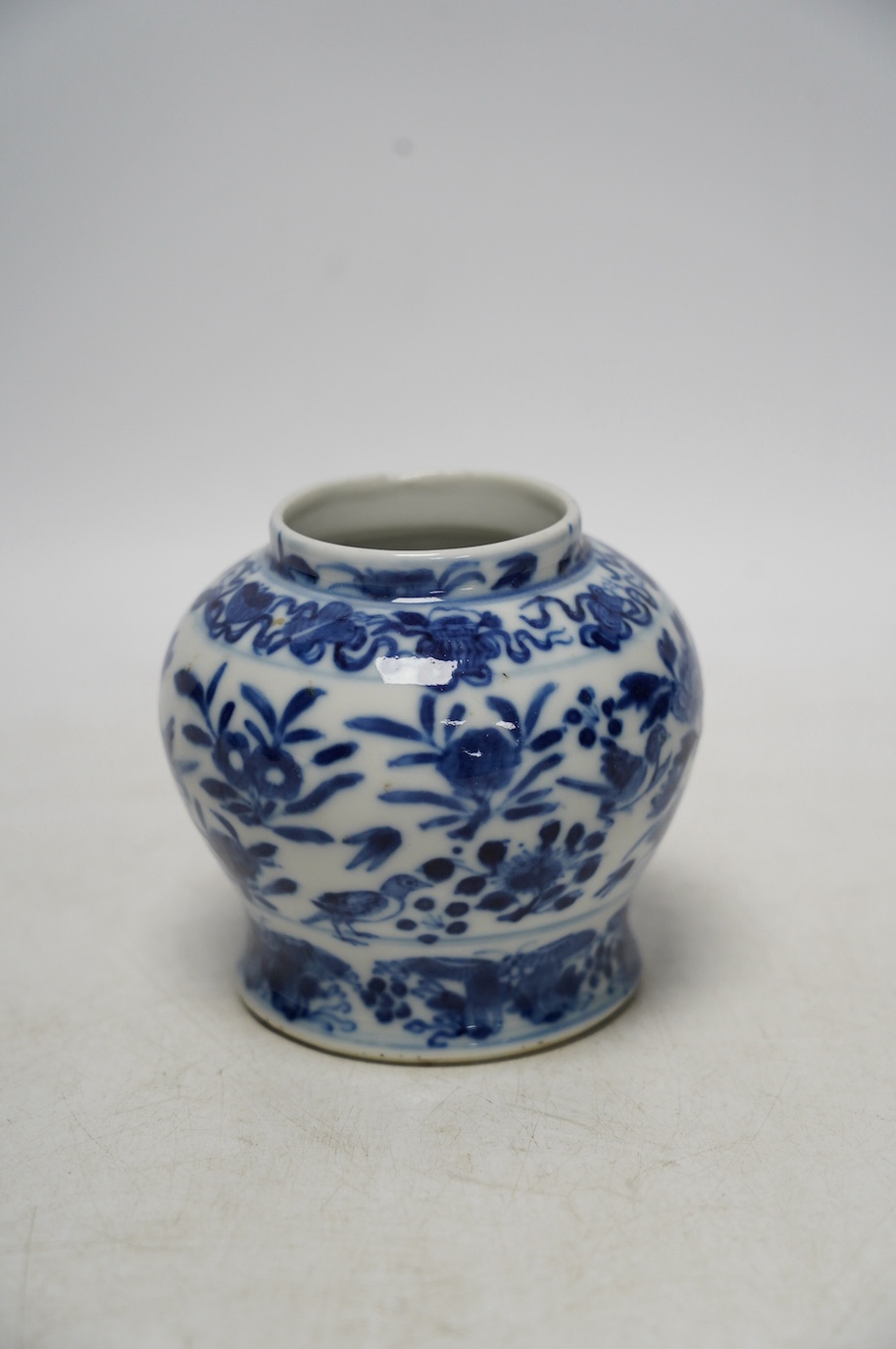 A Chinese bulbous jar, Kangxi mark but later, 9cm. Condition - good